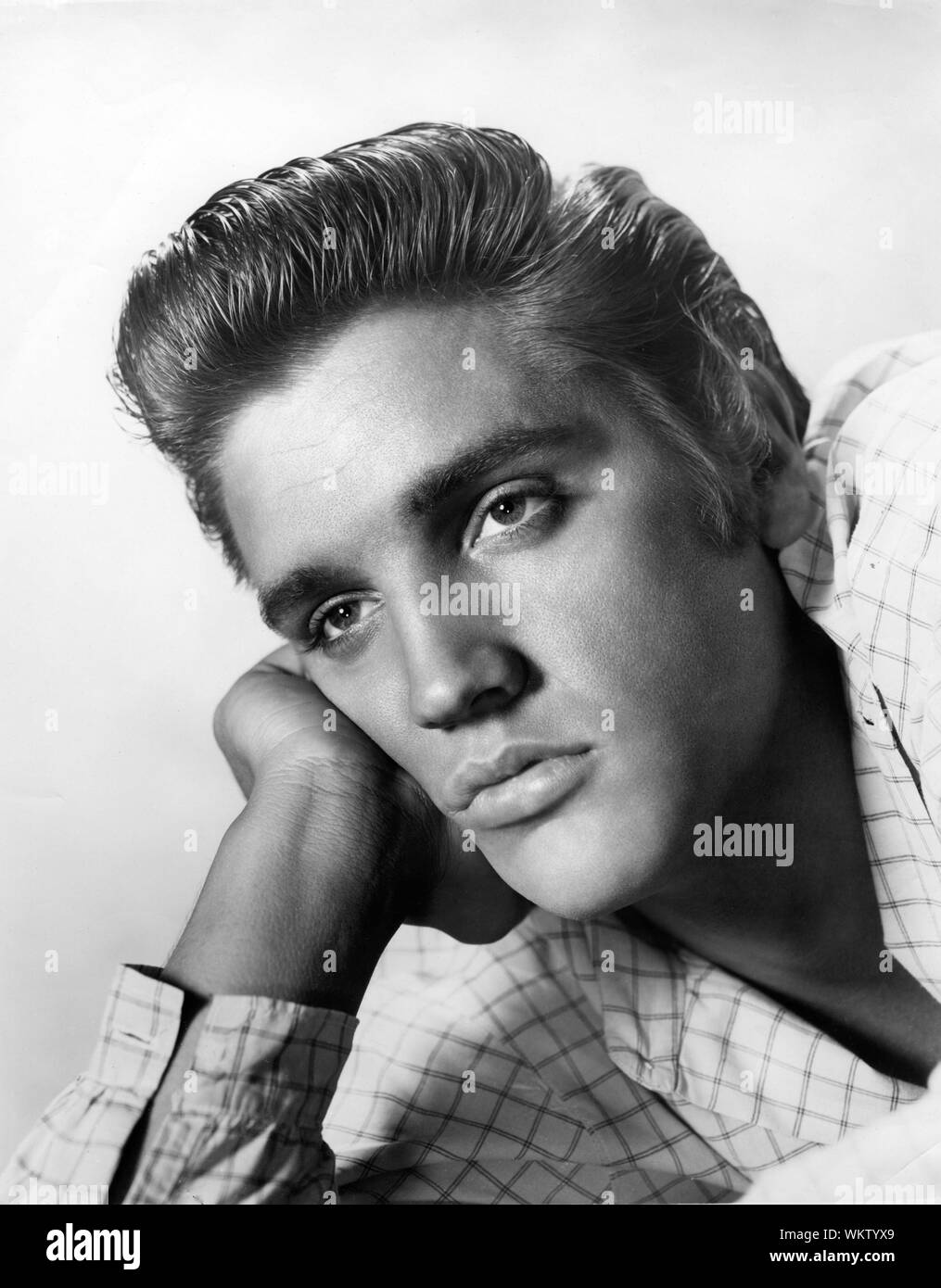 ELVIS PRESLEY portrait as Clint Reno in LOVE ME TENDER 1956 director Robert D. Webb Twentieth Century Fox Stock Photo