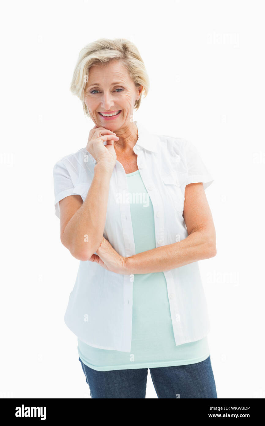 Happy mature woman smiling at camera on white background Stock Photo ...