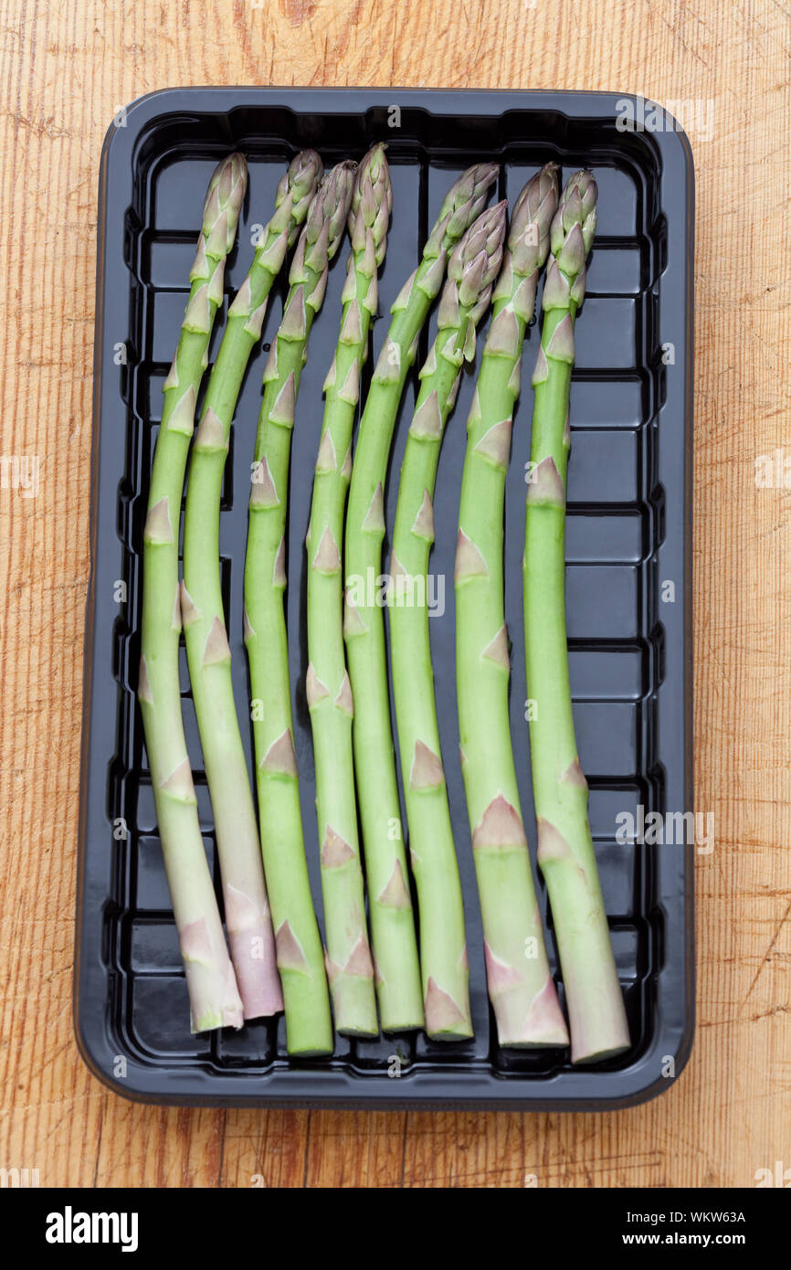 Fresh asparagus in a plastic tray Stock Photo Alamy
