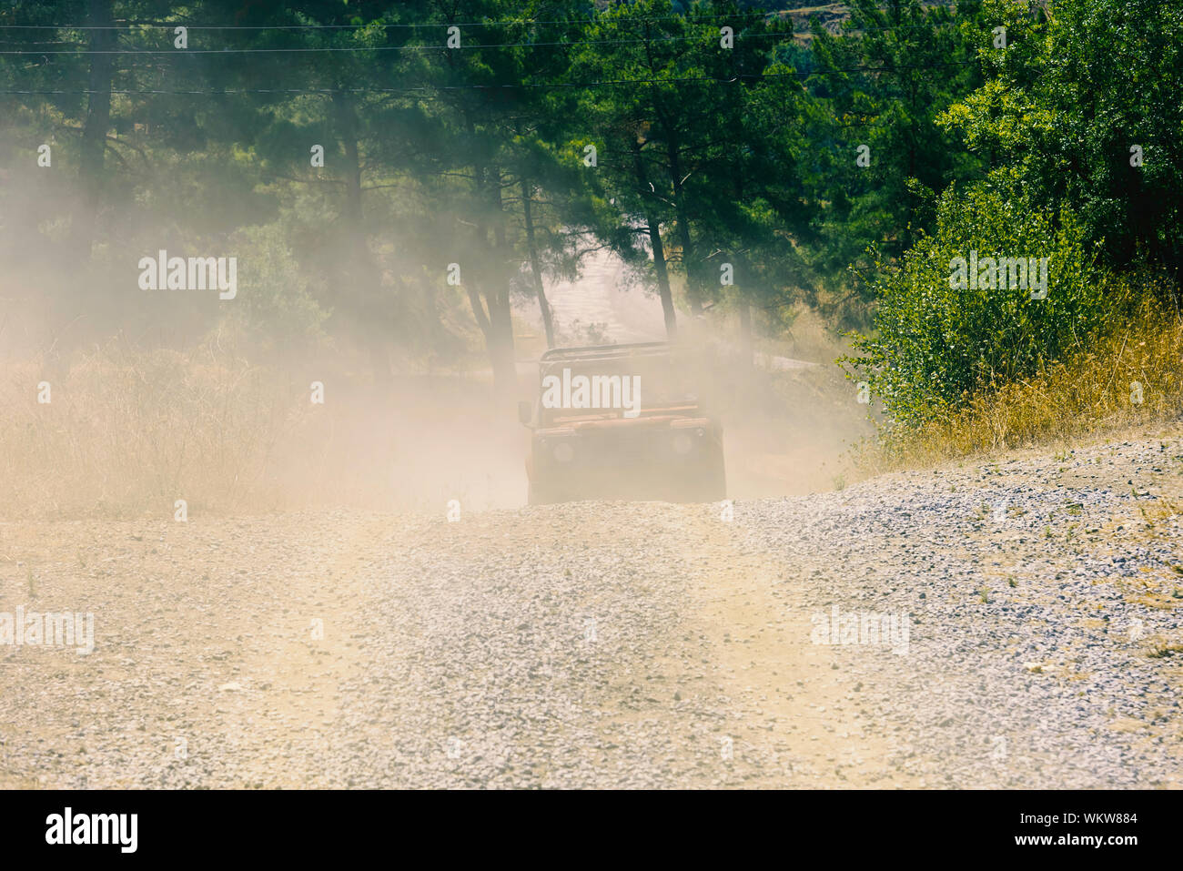 Off-road Vehicle On Dirt Road Stock Photo