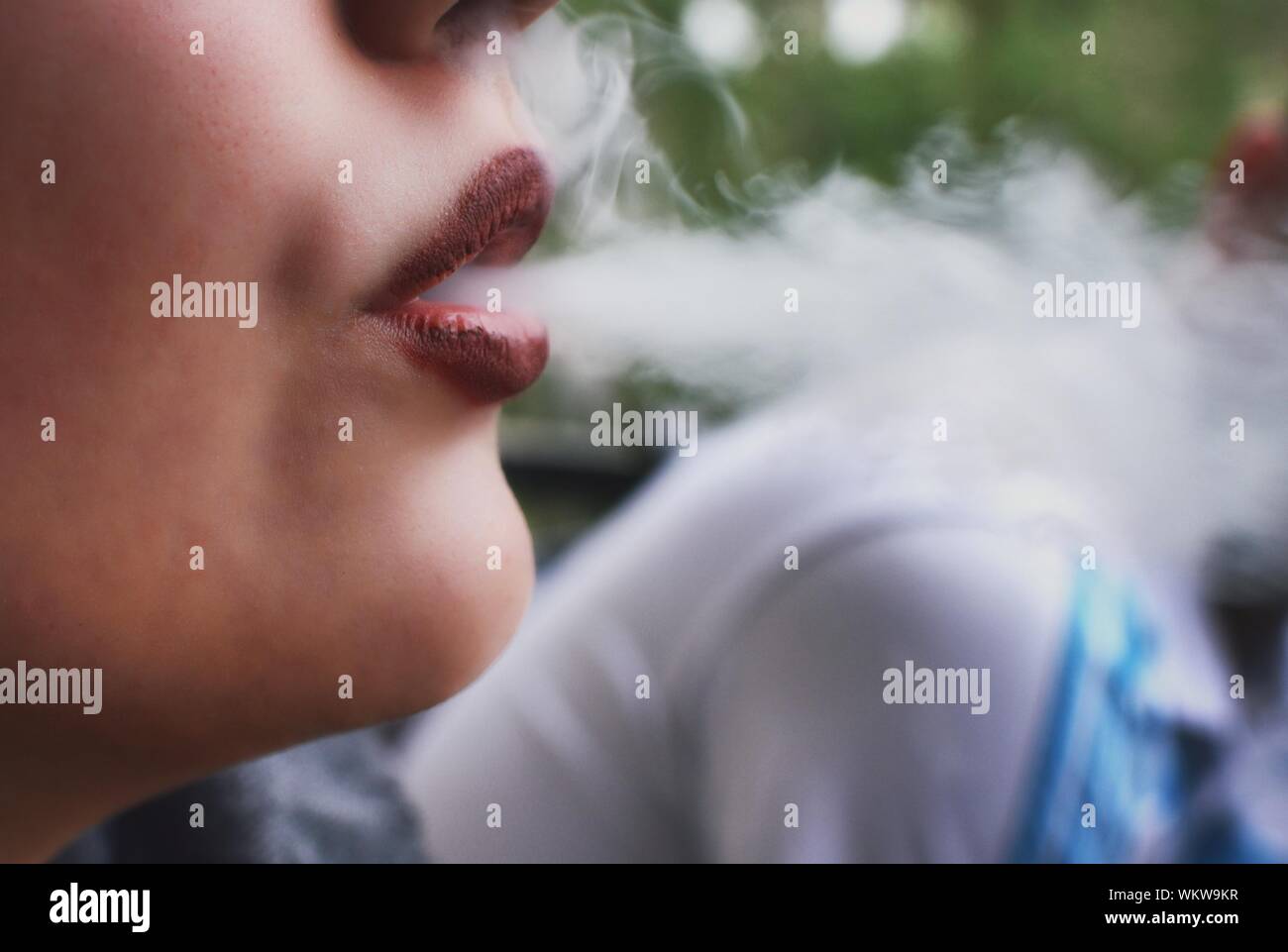 Woman Exhaling Smoke Stock Photos Woman Exhaling Smok