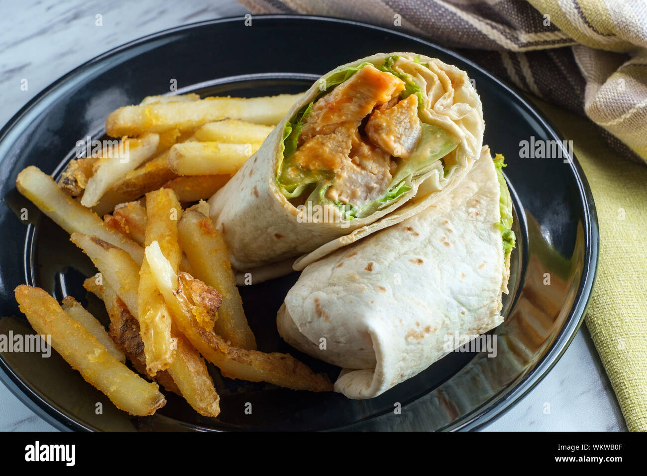 Grilled buffalo chicken sandwich wrap with romaine lettuce bleu cheese ...