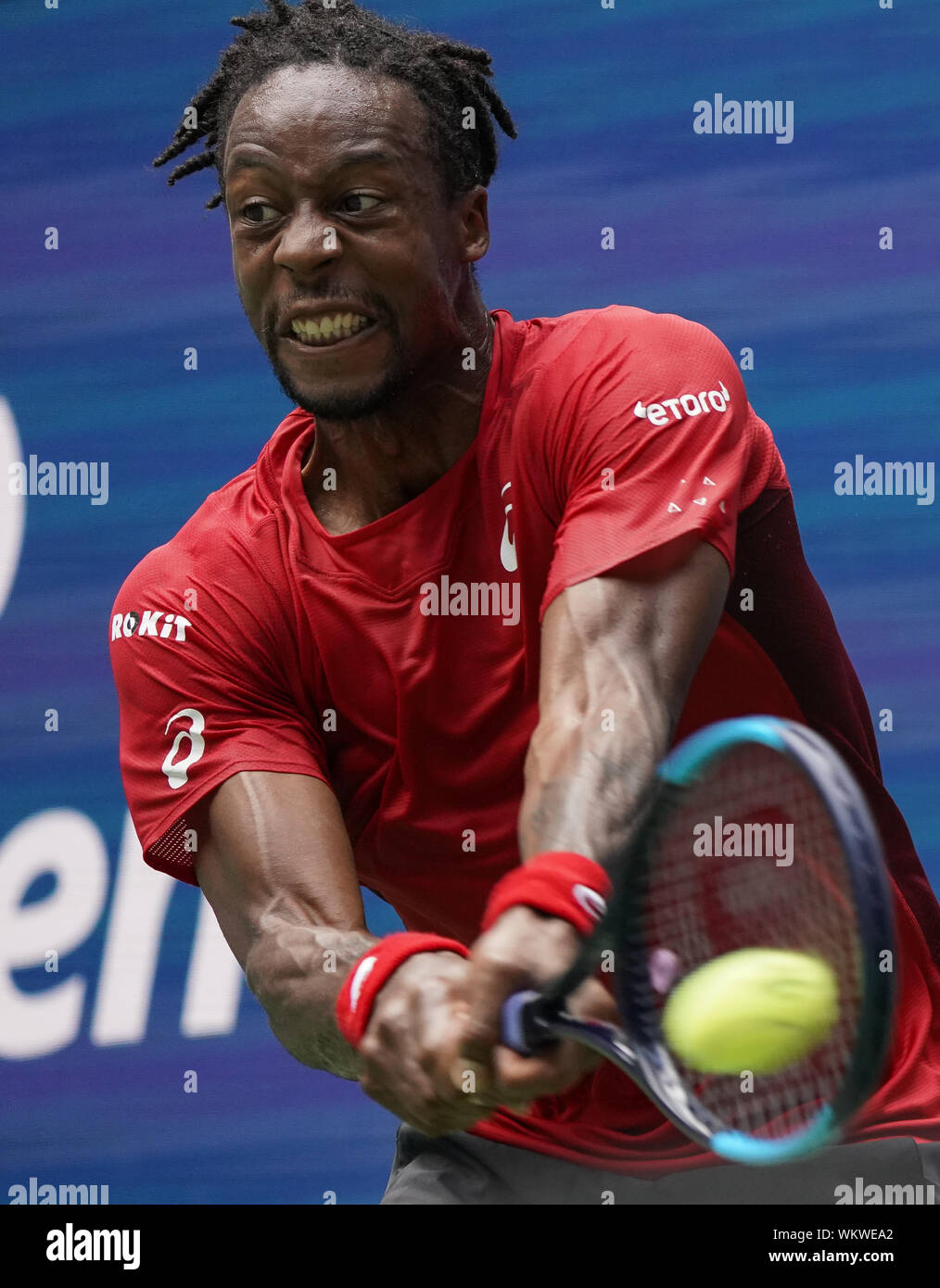 Gael Monfils, of France, returns to Matteo Berrettini, of Italy, during the quarterfinals of the U.S. Open tennis championships Wednesday, Sept