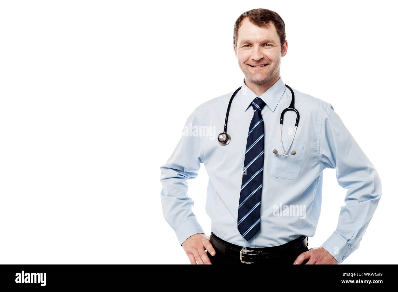 Experienced male physician with hands on his waist Stock Photo