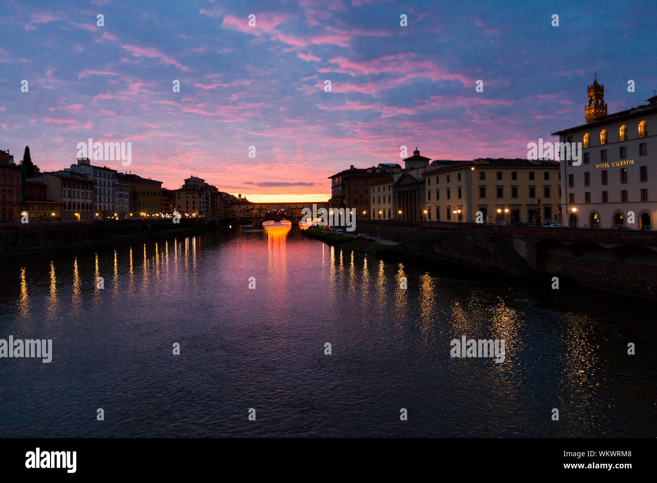The evocative spring sunset over the Arno. Florence, Tuscany. Italy Stock Photo