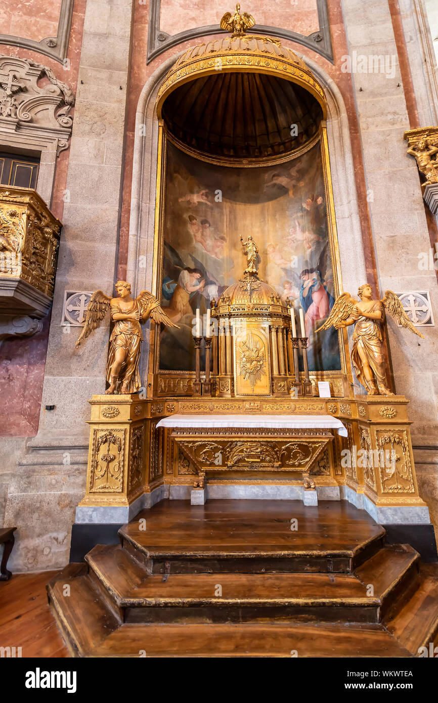 Porto, Portugal, July 19, 2019:  View Golden Tabernacle with consecrated hosts inside  of Clerigos Church (Igreja dos Clerigos in Portuguese) in Porto Stock Photo
