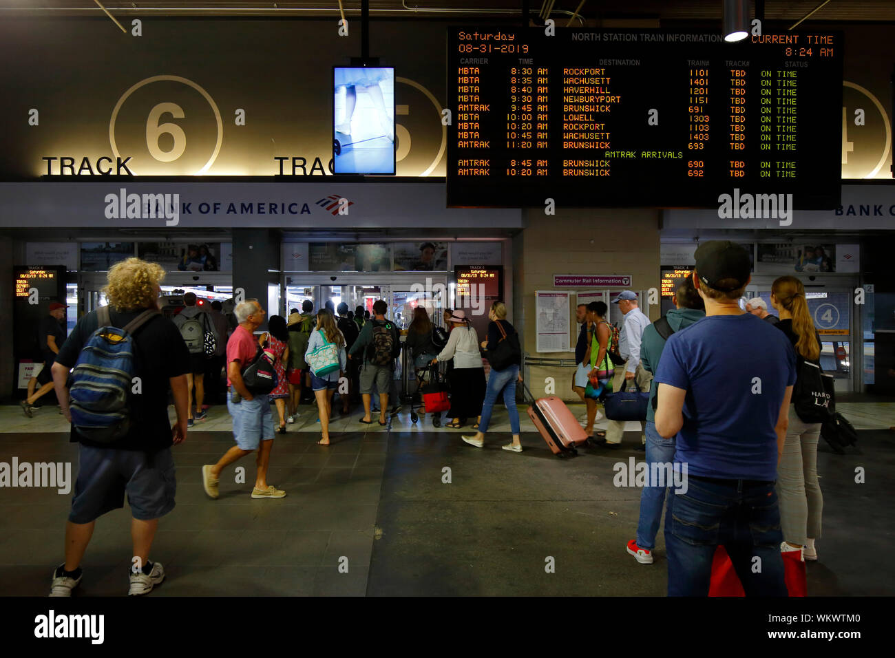 weekend-travelers-at-boston-s-north-station-board-a-train-to-salem
