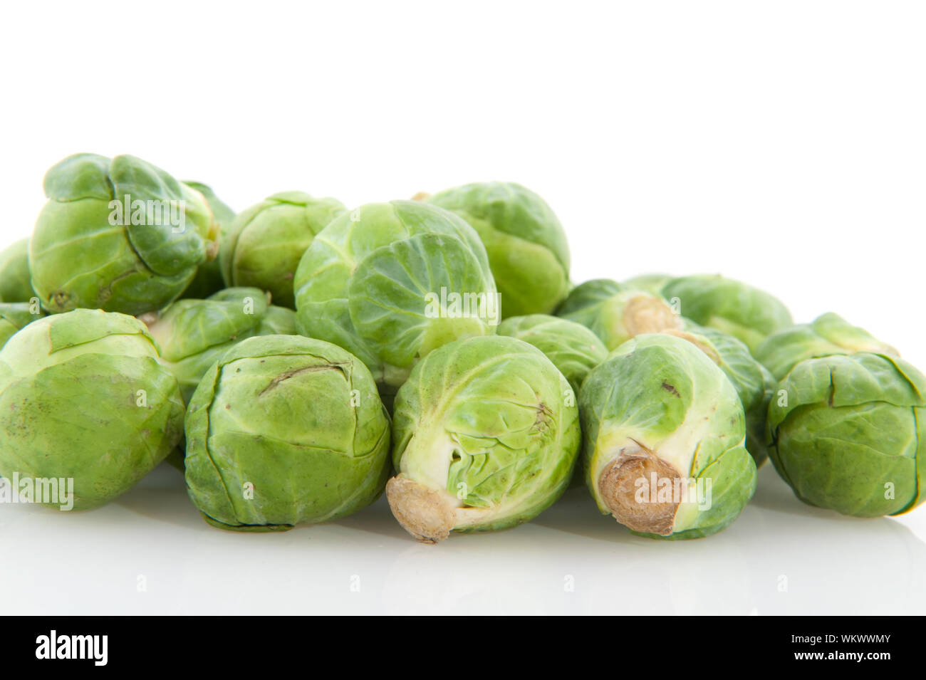 Brussels sprouts vegetables in studio with white background Stock Photo