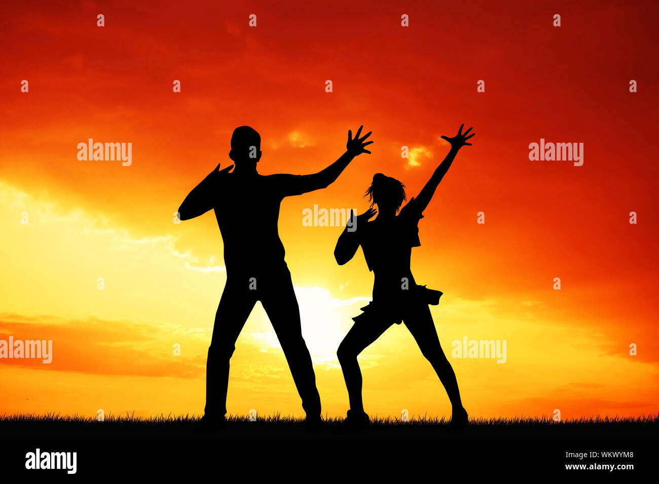 Acrobatic rock and roll at sunset Stock Photo - Alamy