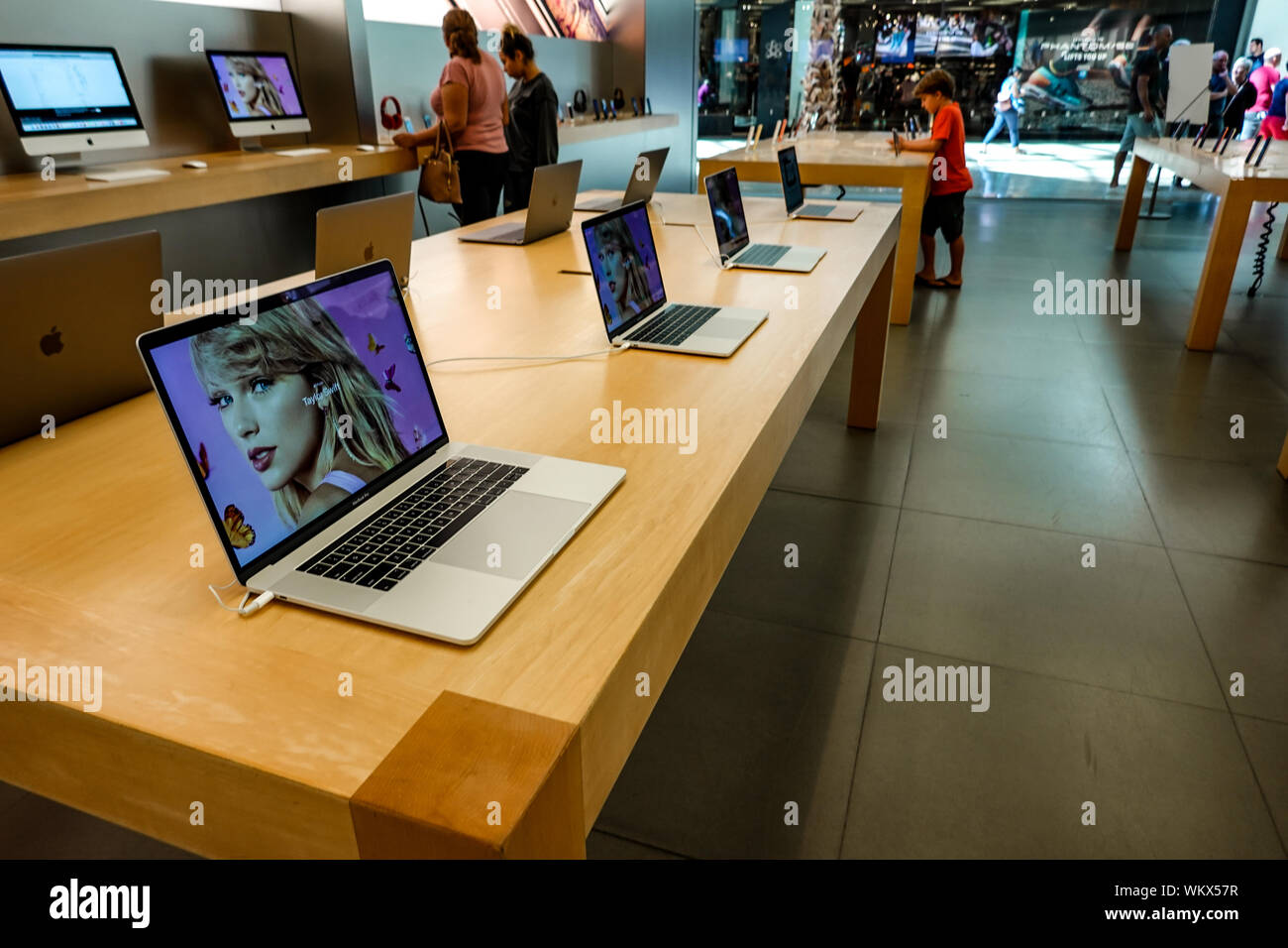 Orlando,FL/USA-8/27/19: A row of MacBook Pros on display at a retail store. Stock Photo