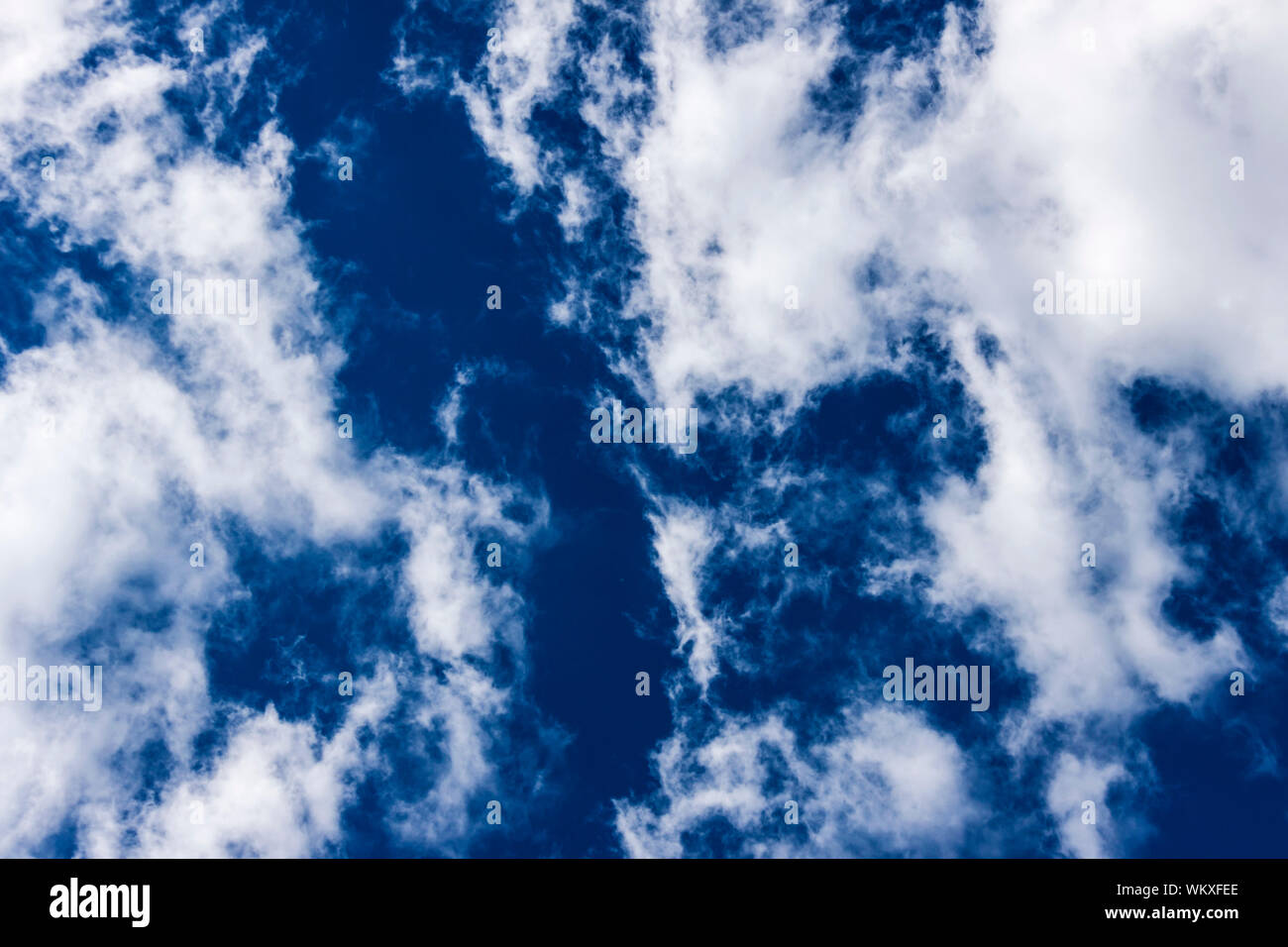 Blue sky with white clouds - photography Stock Photo - Alamy