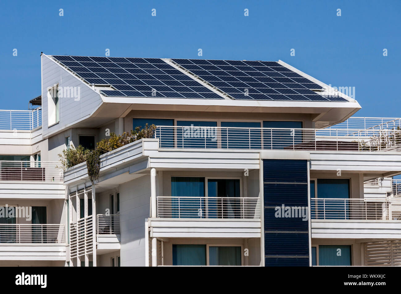 Solar panels on the roof of a modern building - photography Stock Photo ...