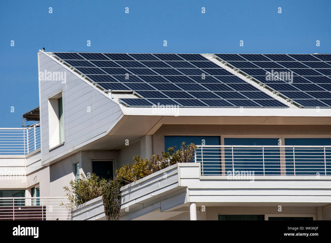 Solar panels on the roof of a modern building - photography Stock Photo ...
