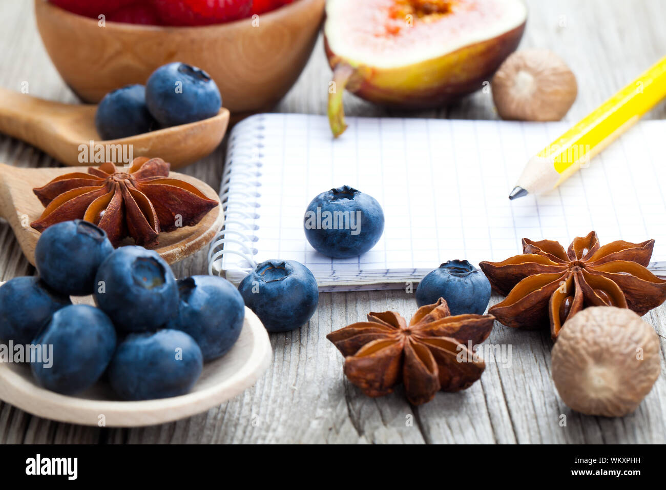 top view of recipe book with ingredients on wooden table Stock Photo - Alamy