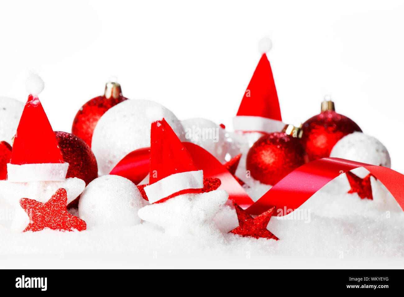 Christmas card with beautiful red and white decorations in snow Stock Photo - Alamy