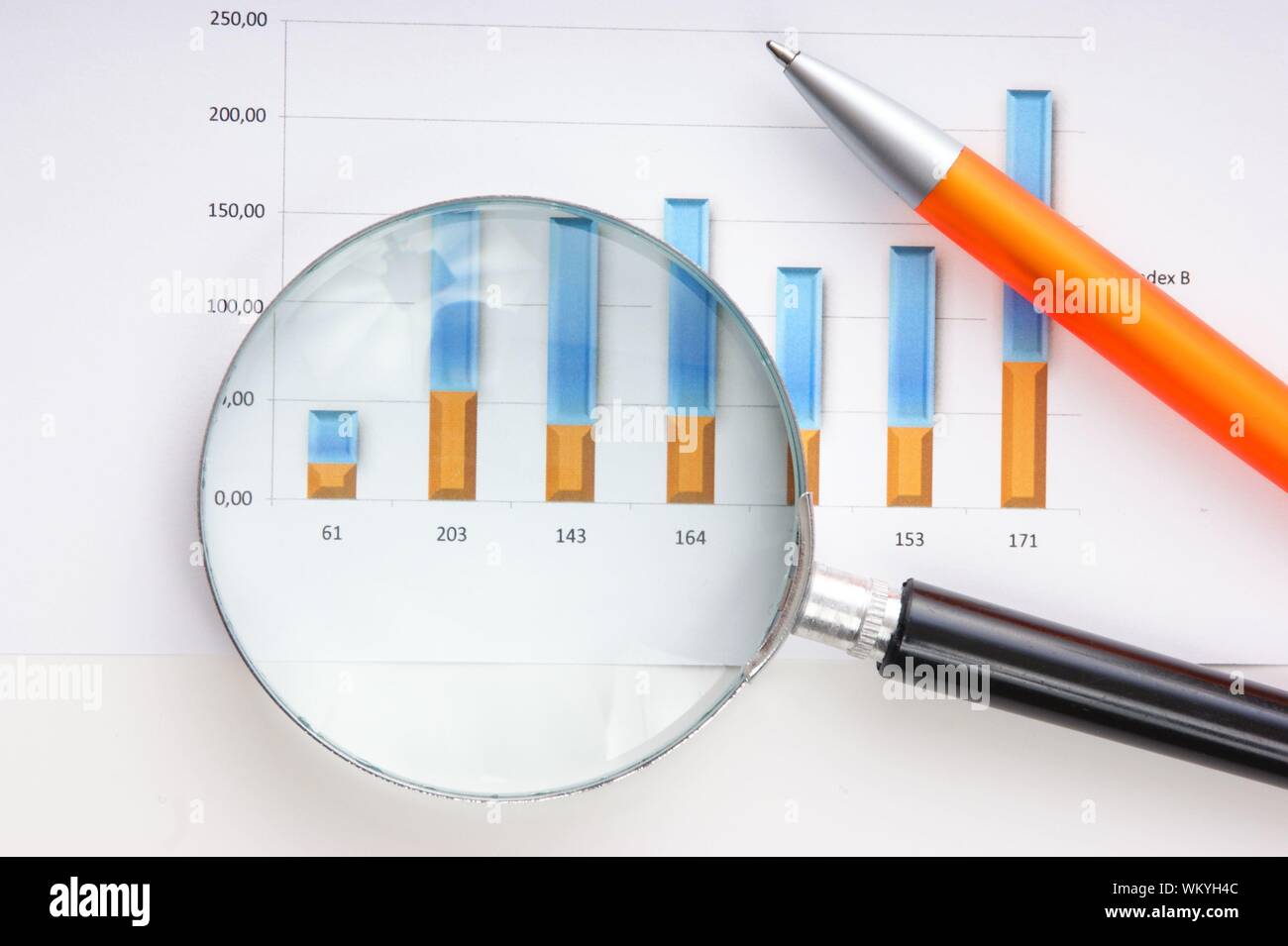 Graphs tables and documents laid on the table Stock Photo