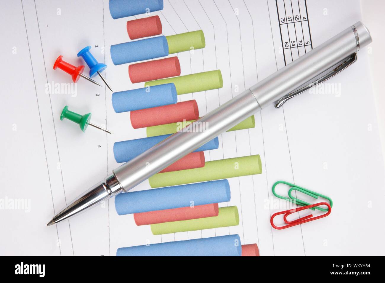 Graphs tables and documents laid on the table Stock Photo