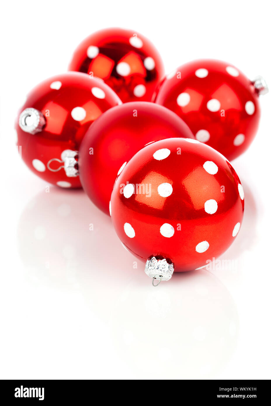 red polka dot Christmas bauble, isolated over white Stock Photo