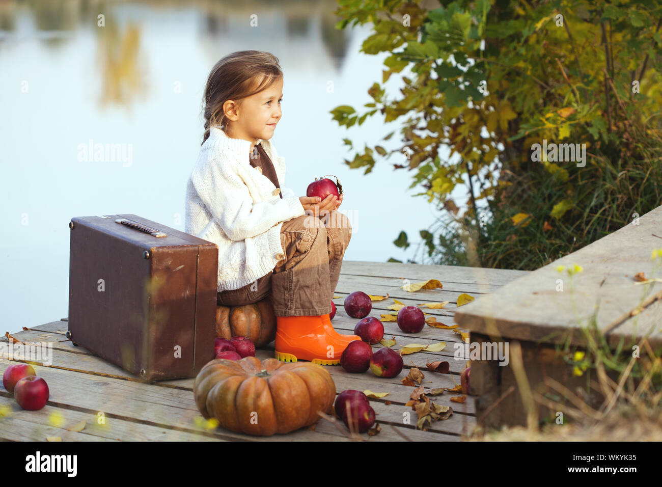 Cute child in autumn Stock Photo
