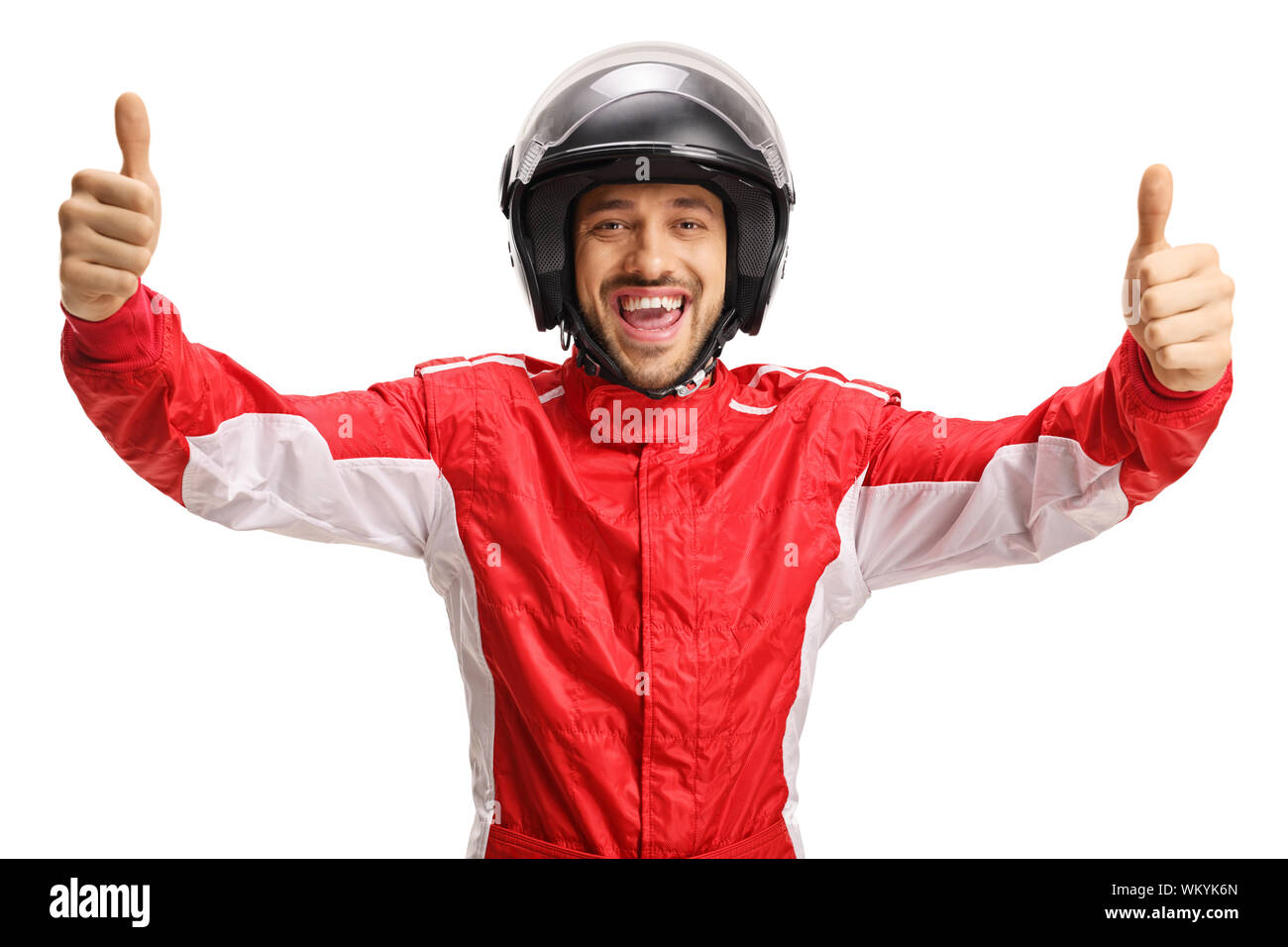 Cheerful racer with a helmet showing both thumbs up isolated on white background Stock Photo