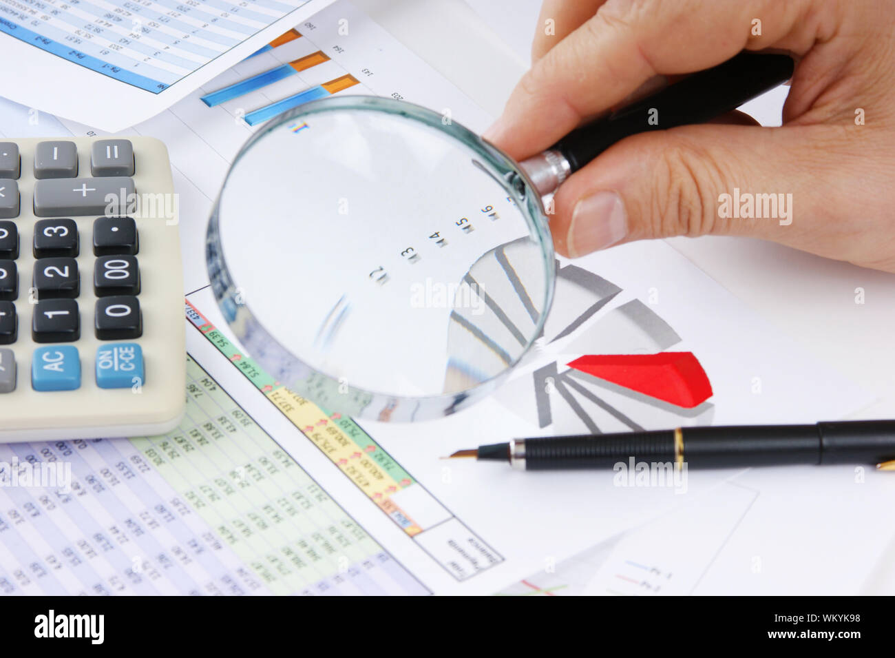 Graphs tables and documents laid on the table Stock Photo