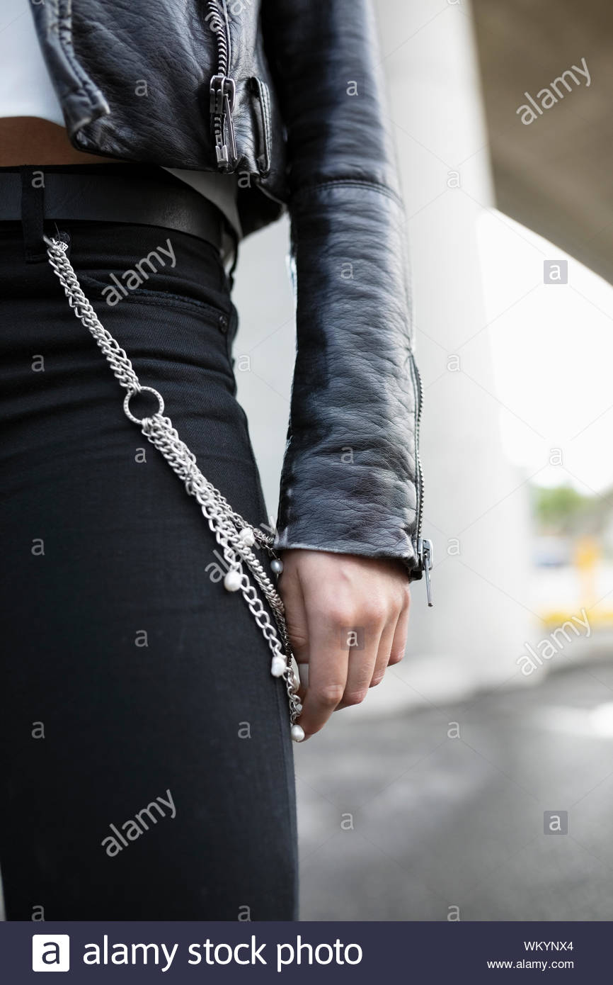 Close up young woman wearing belt chain Stock Photo Alamy