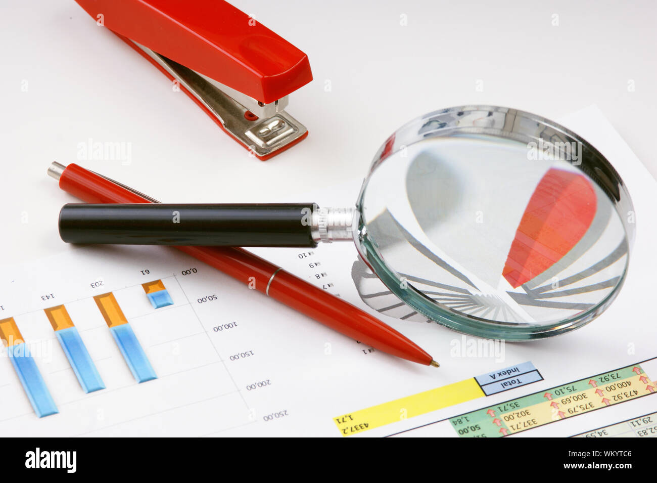 Graphs tables and documents laid on the table Stock Photo