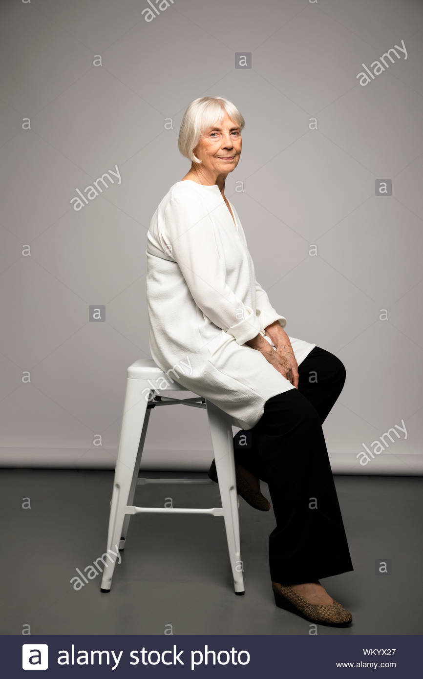 Businesswoman sitting stool hi-res stock photography and images - Alamy