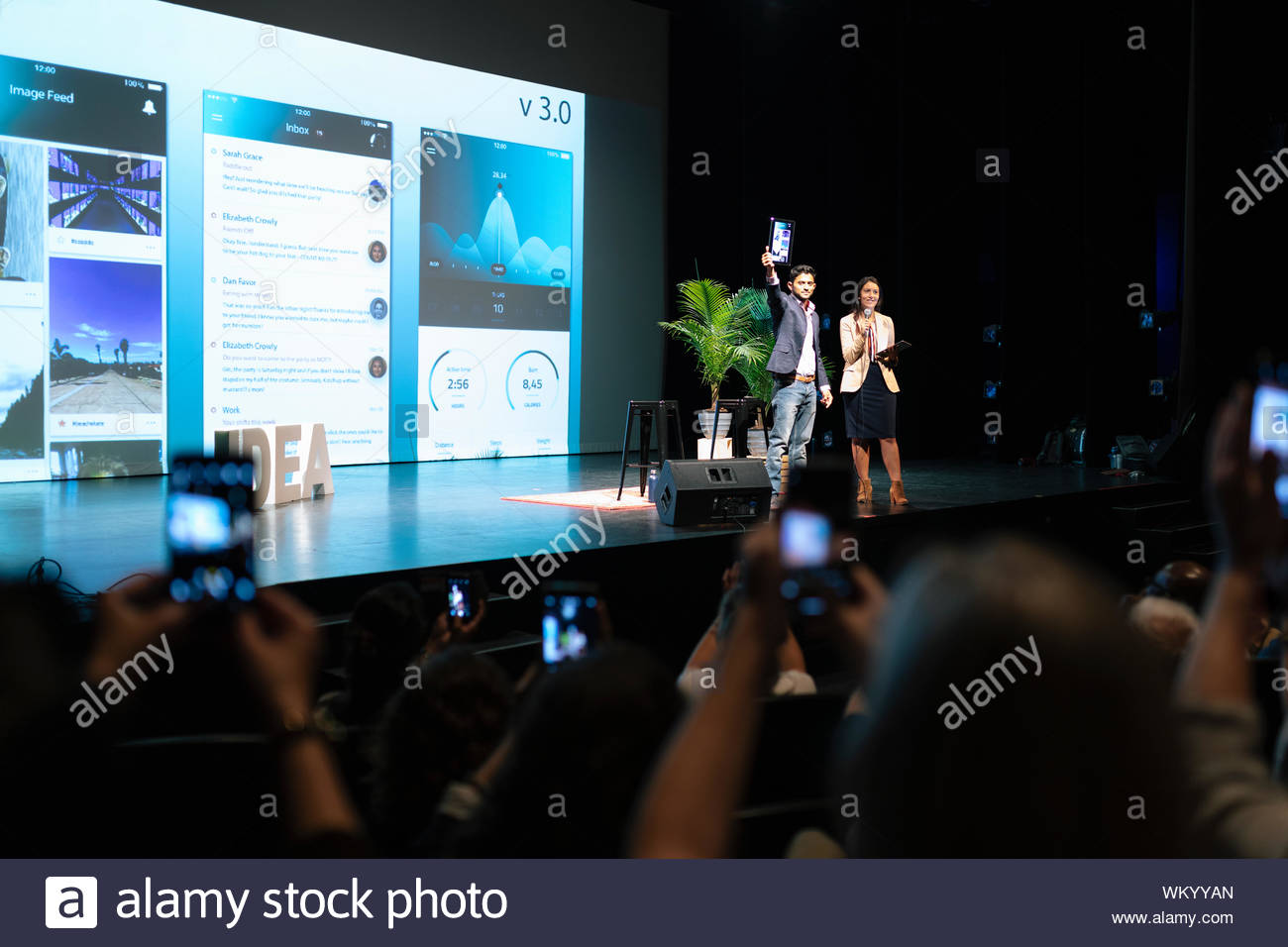 App development speakers on stage Stock Photo