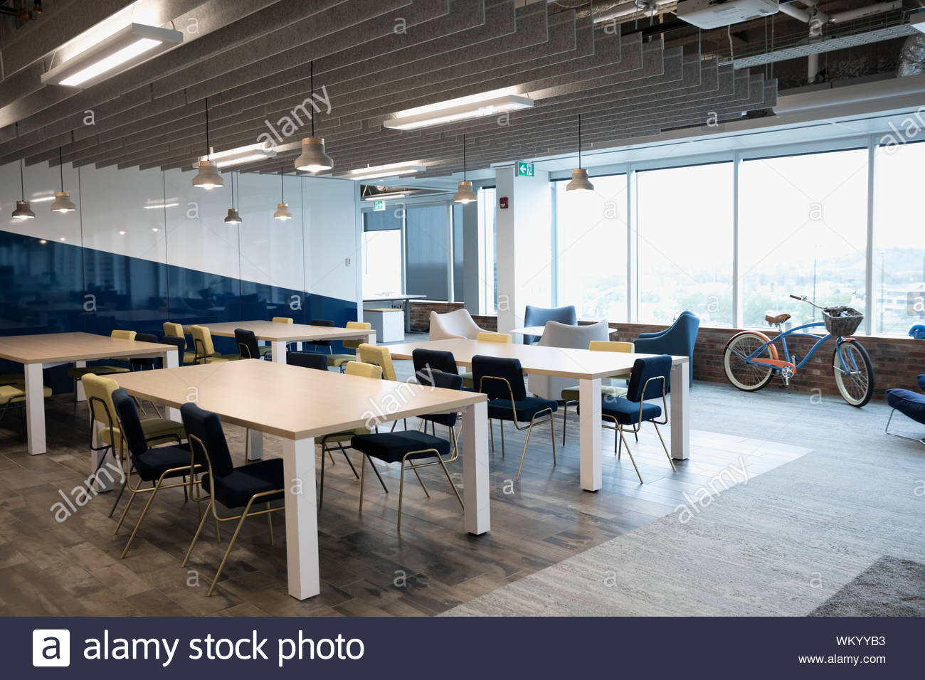 Modern coworking space with tables and chairs Stock Photo