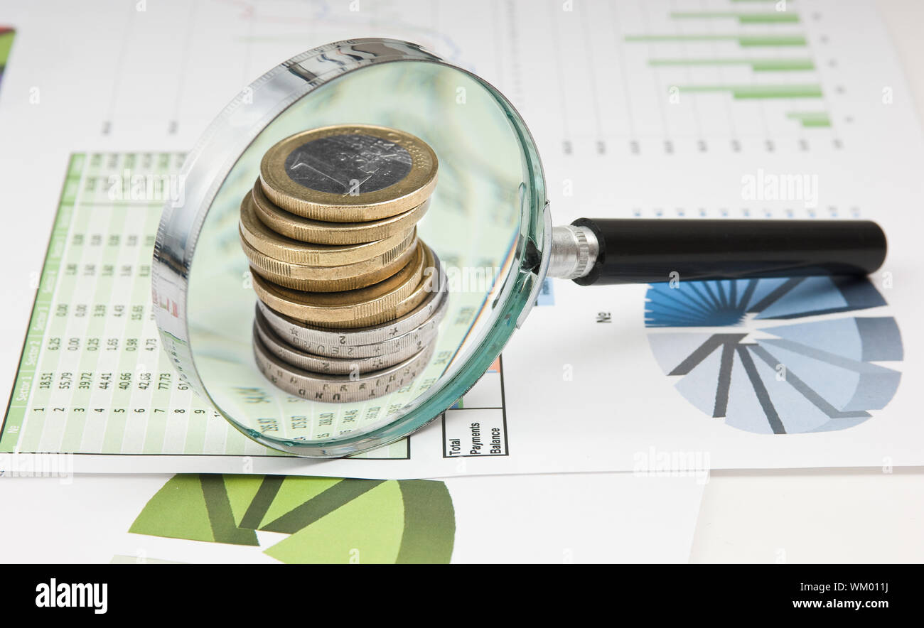 Graphs tables and documents laid on the table Stock Photo