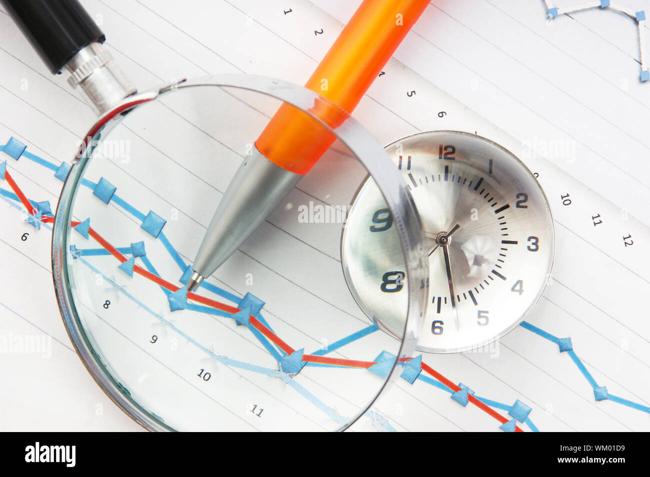 Graphs tables and documents laid on the table Stock Photo