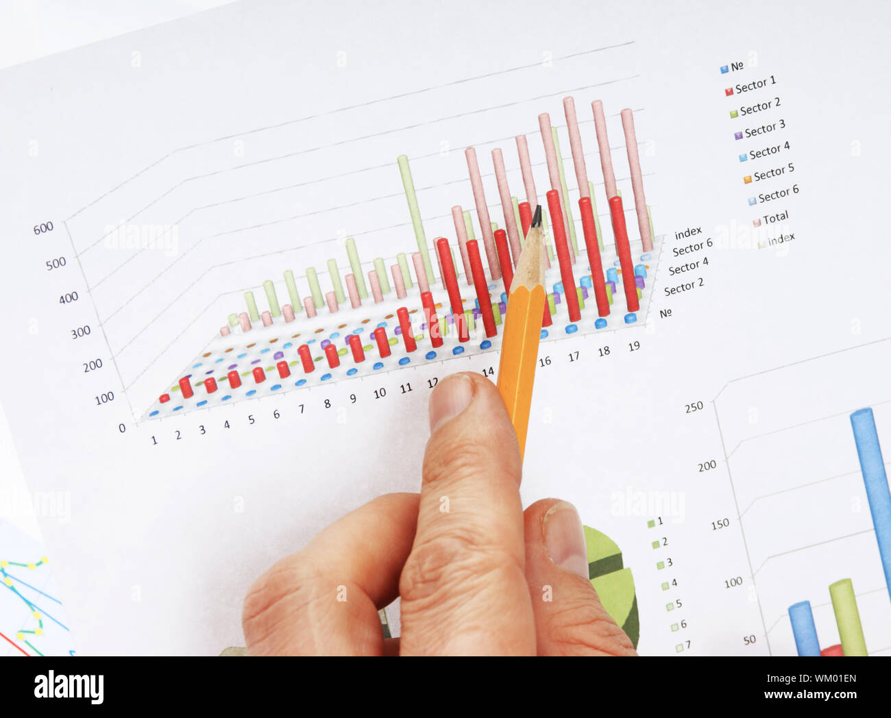Graphs tables and documents laid on the table Stock Photo