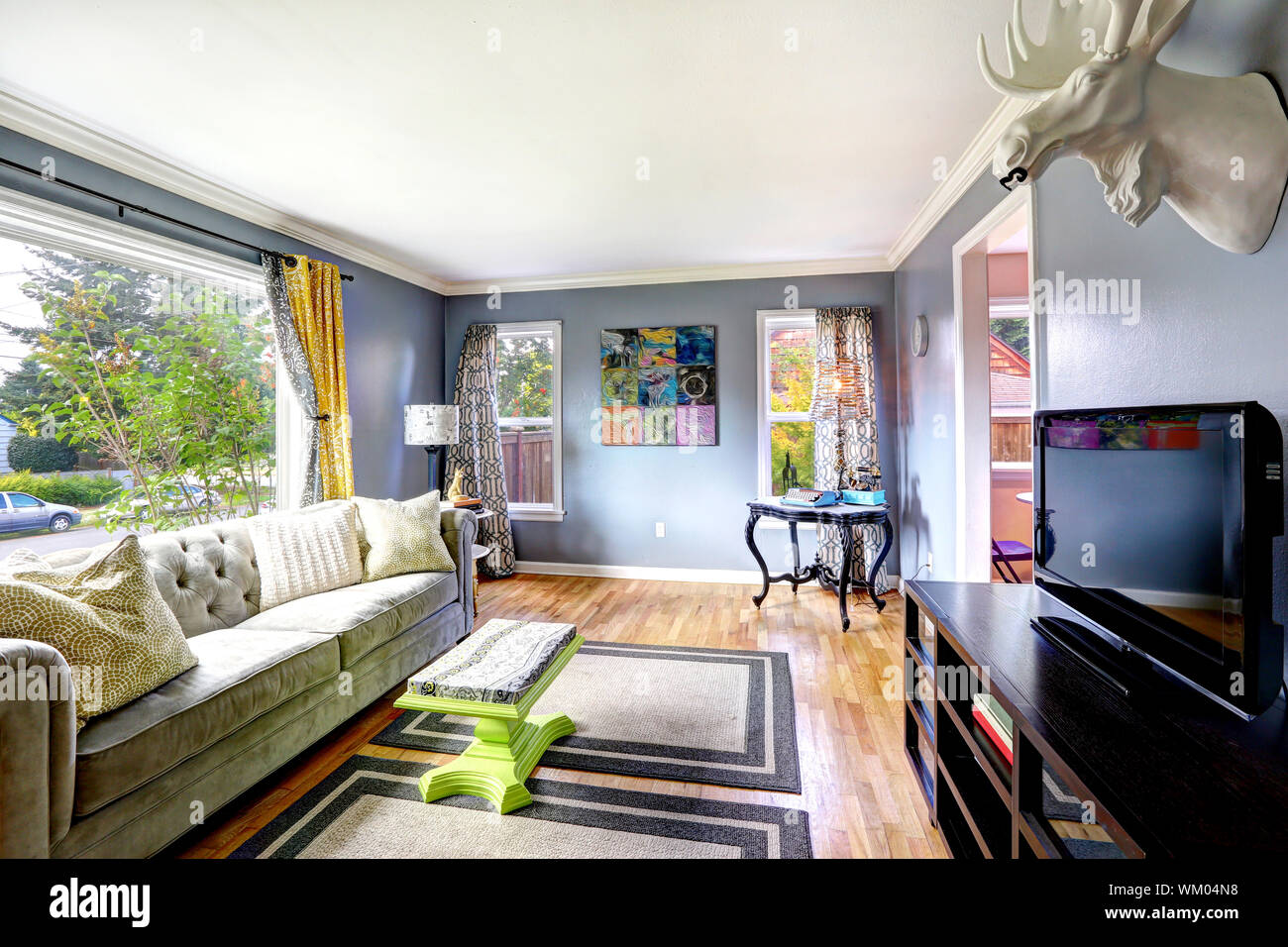 Bright Living Room Interior With Large Window Furnished