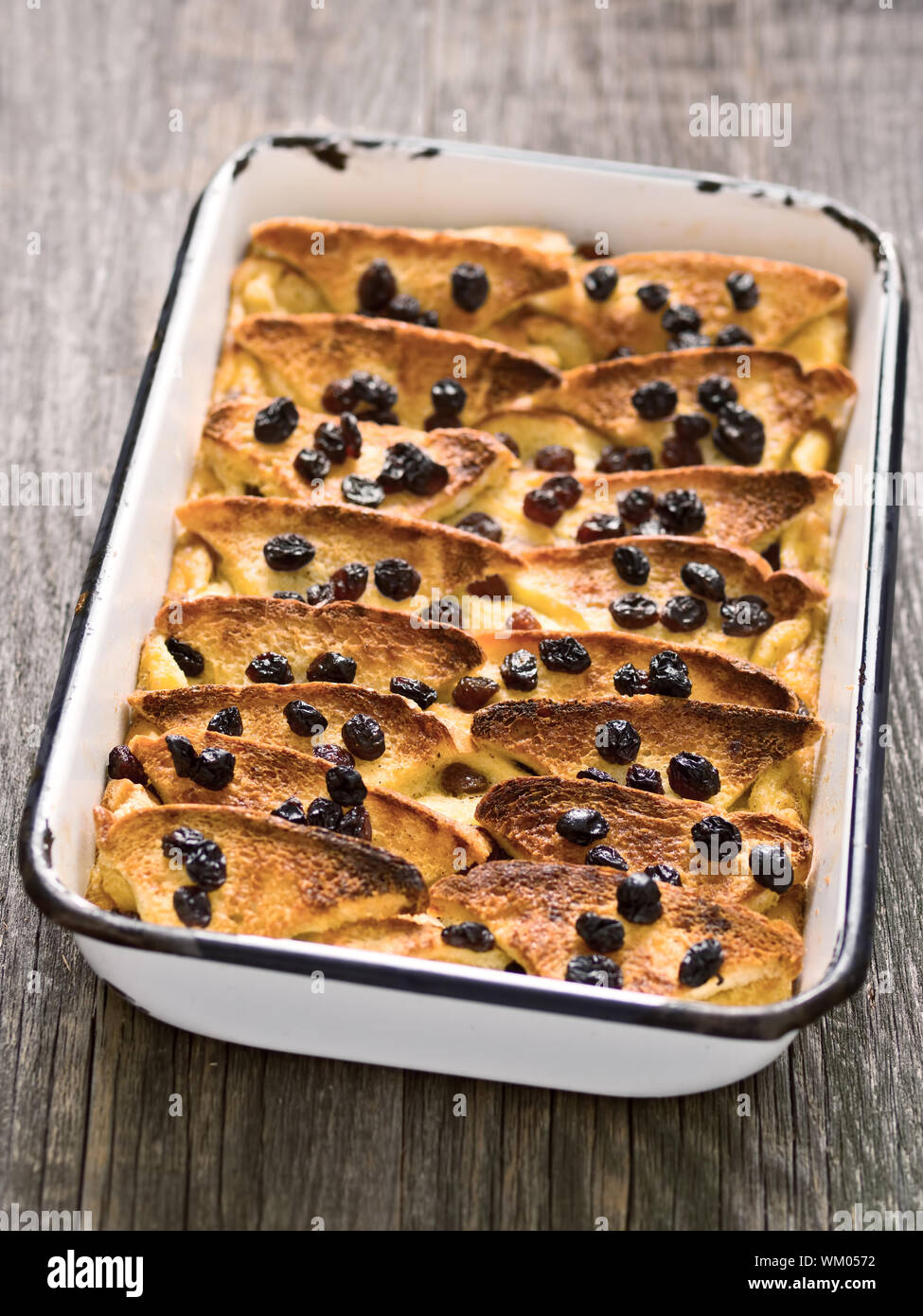 close up of rustic traditional british bread and butter pudding Stock Photo