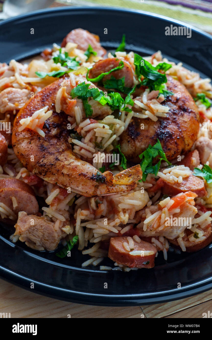 Creole bowl of chicken shrimp and andouille sausage Jambalaya with rice Stock Photo Alamy