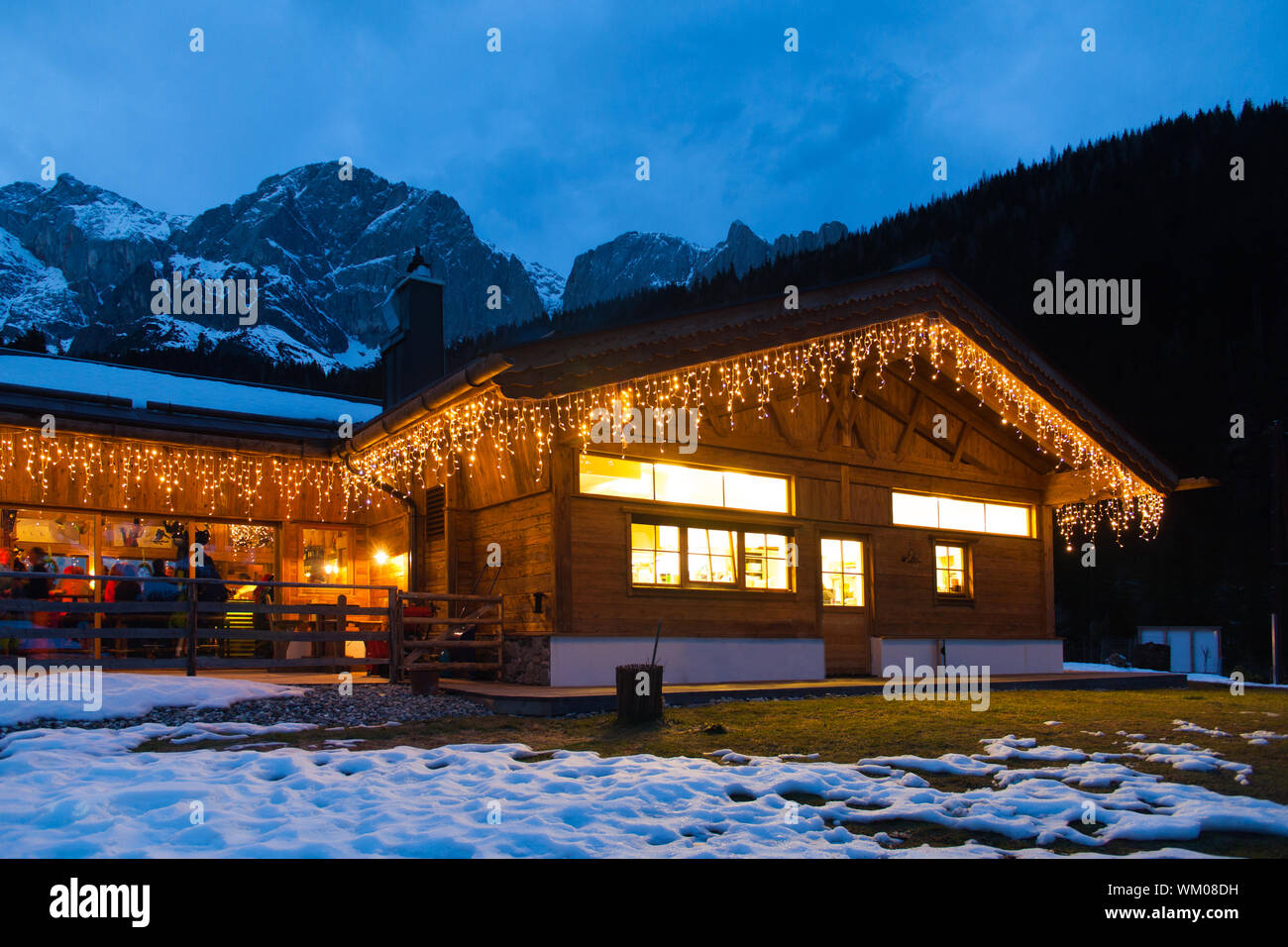 Alpine cottage in winter mountains in Austria Stock Photo