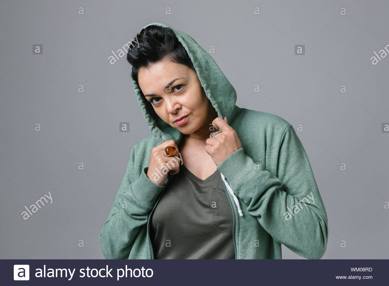 Woman wearing black hood hi-res stock photography and images - Alamy
