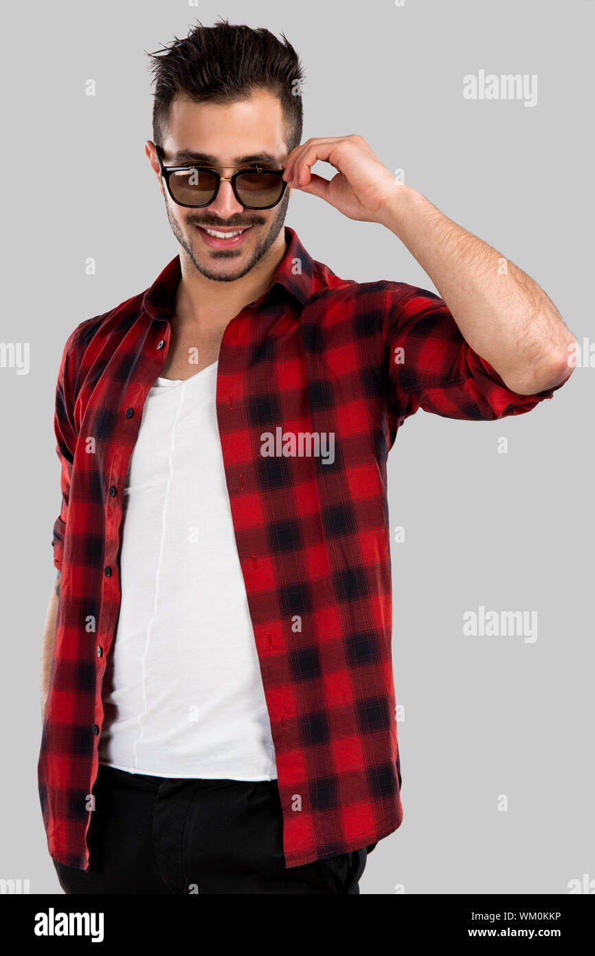 Studio portrait of a handsome young man Stock Photo - Alamy