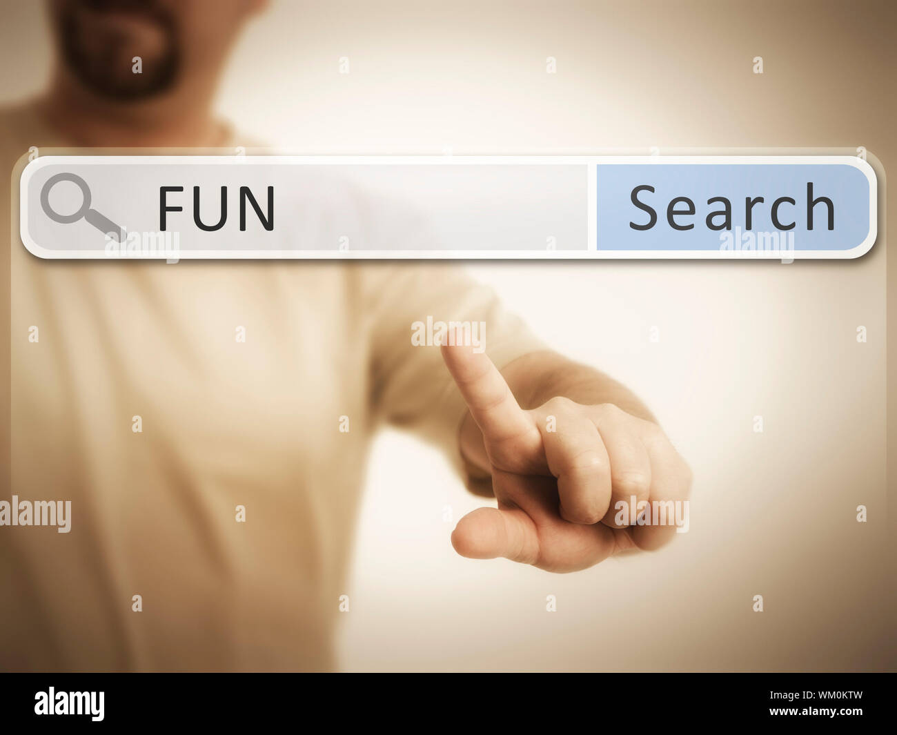 An image of a man who is searching the web after fun Stock Photo - Alamy