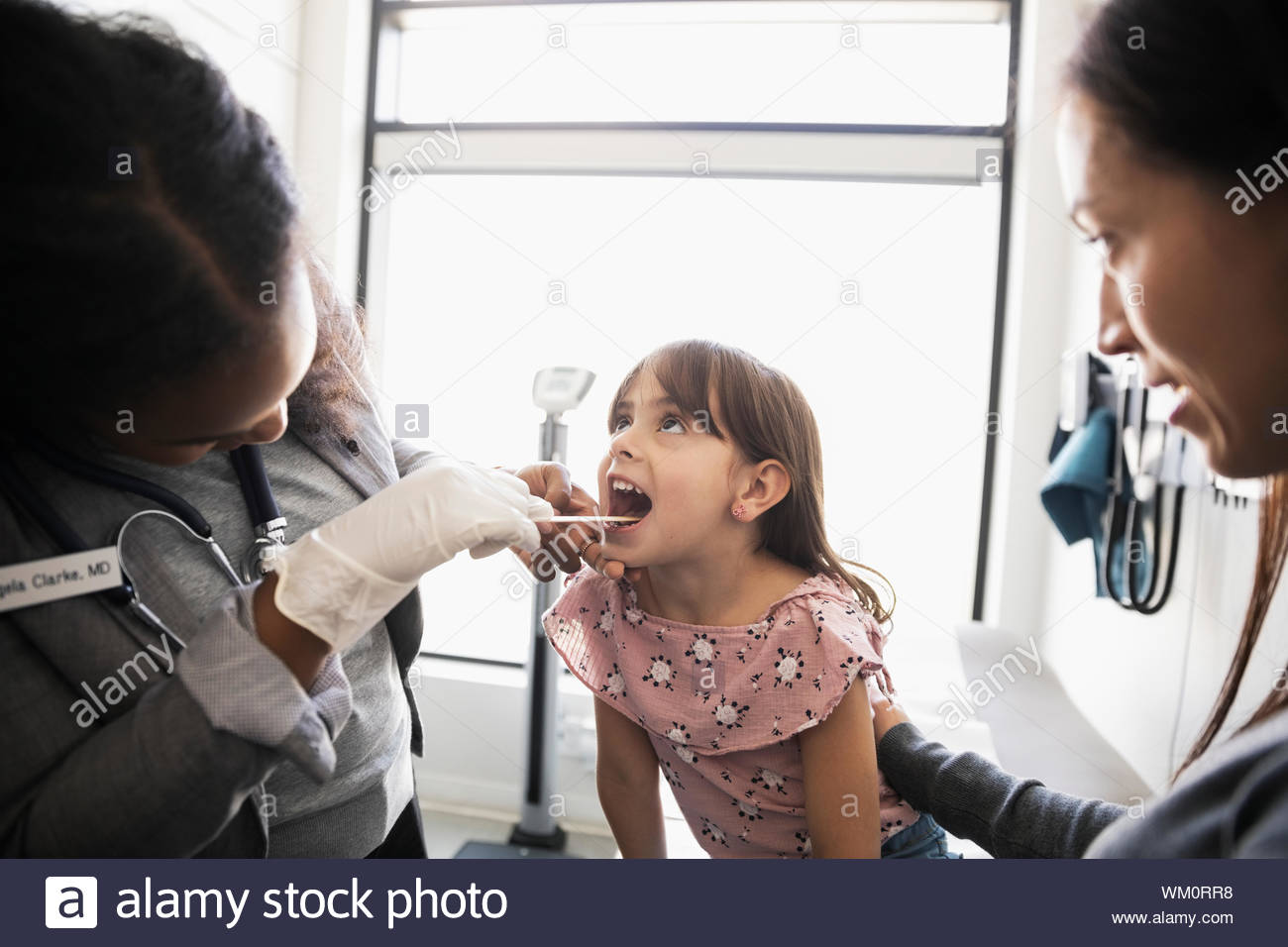 Tongue woman doctor hires stock photography and images Alamy