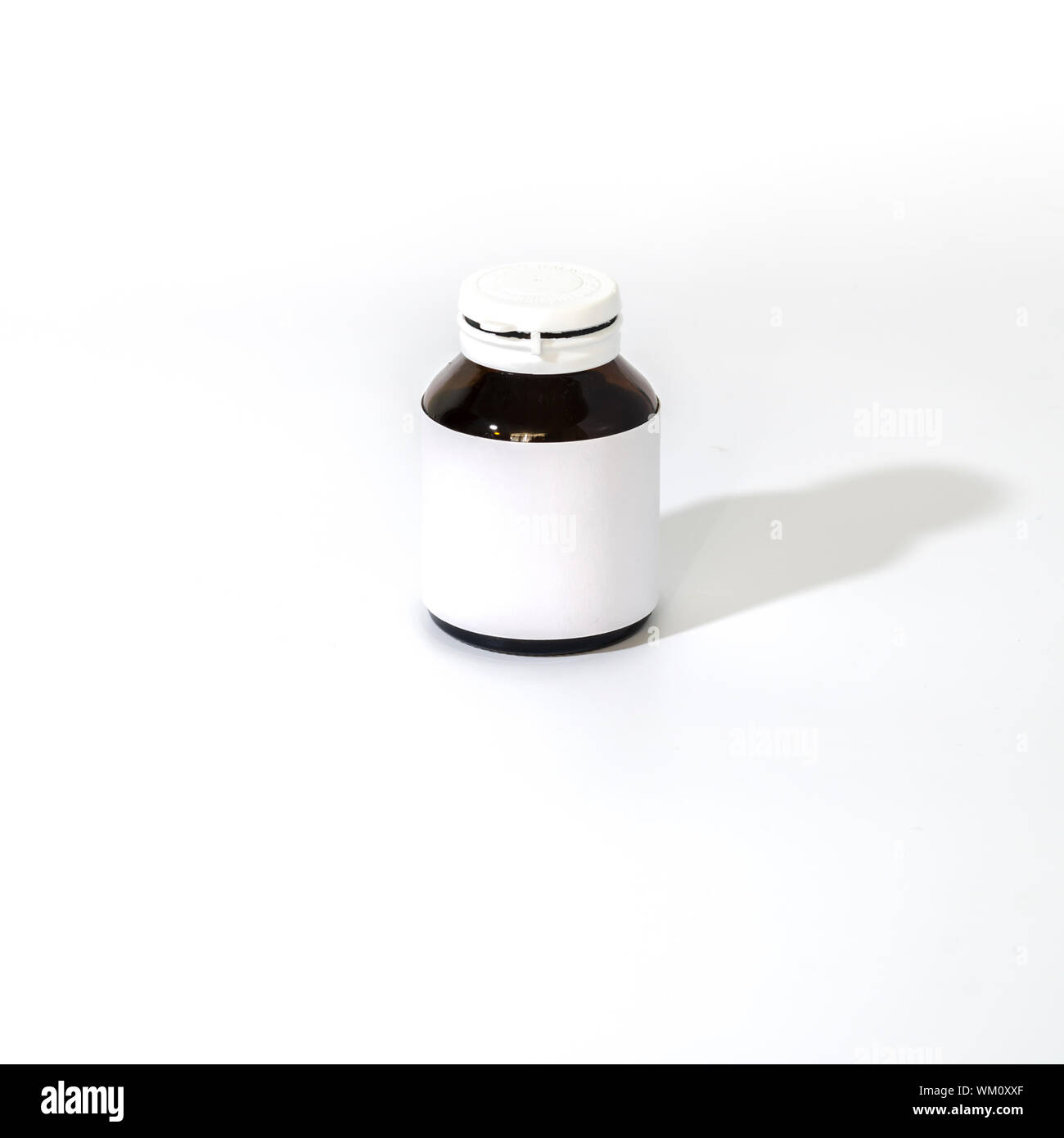 empty pill bottle Stock Photo
