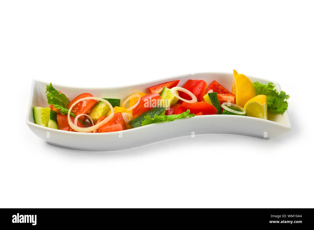 Salad of vegetables isolated on white background Stock Photo - Alamy