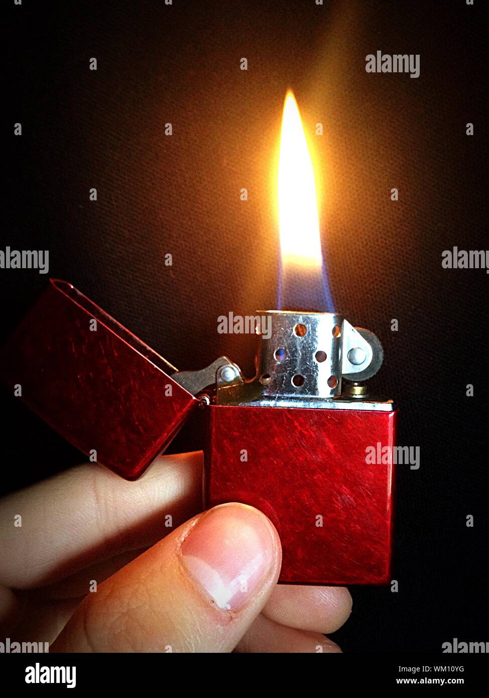 Close-up Of Lit Cigarette Lighter Stock Photo - Alamy