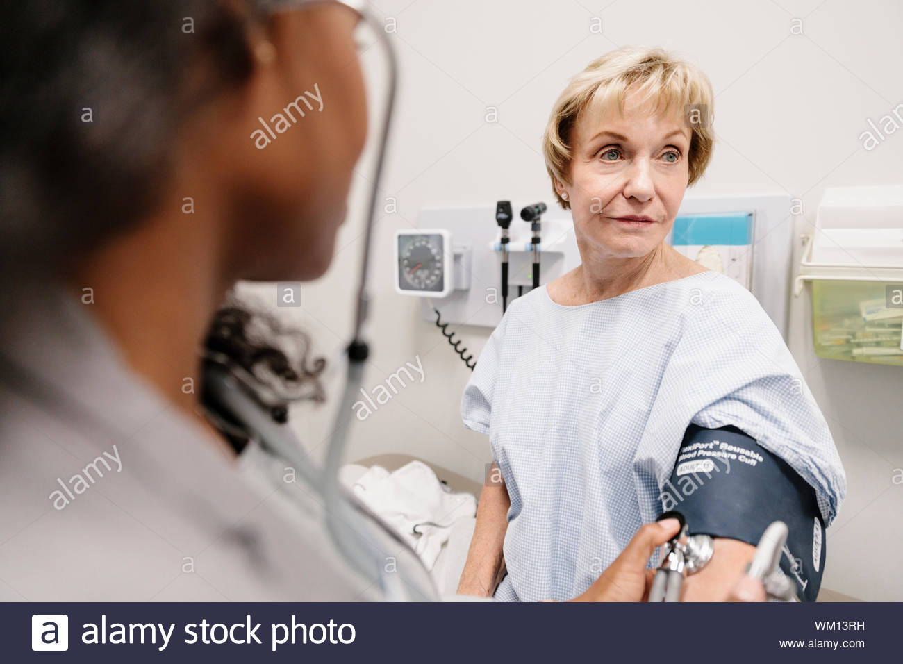 Doctor woman blood pressure hi-res stock photography and images - Alamy