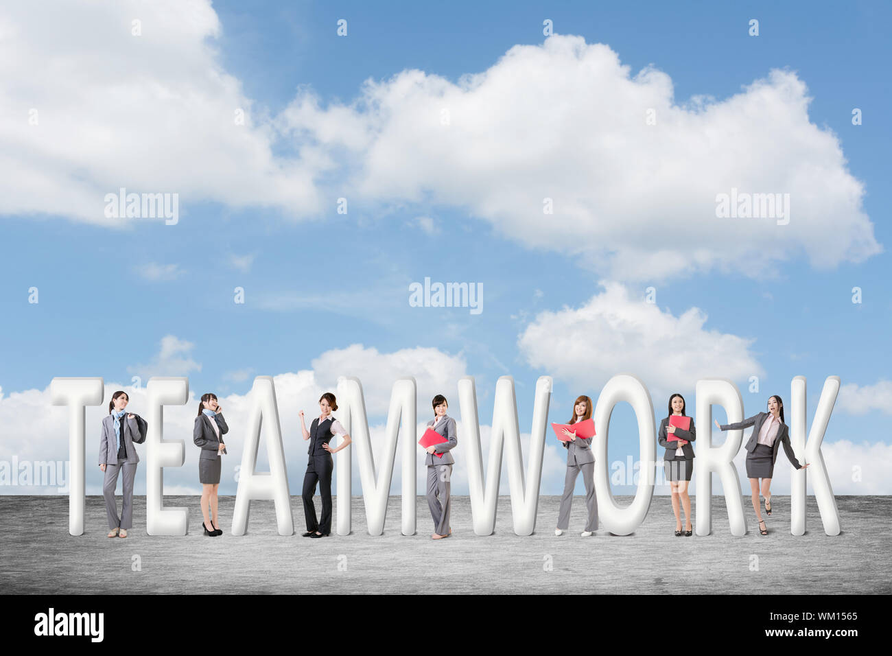 Concept of teamwork with group of business people stand with 3d text. Stock Photo