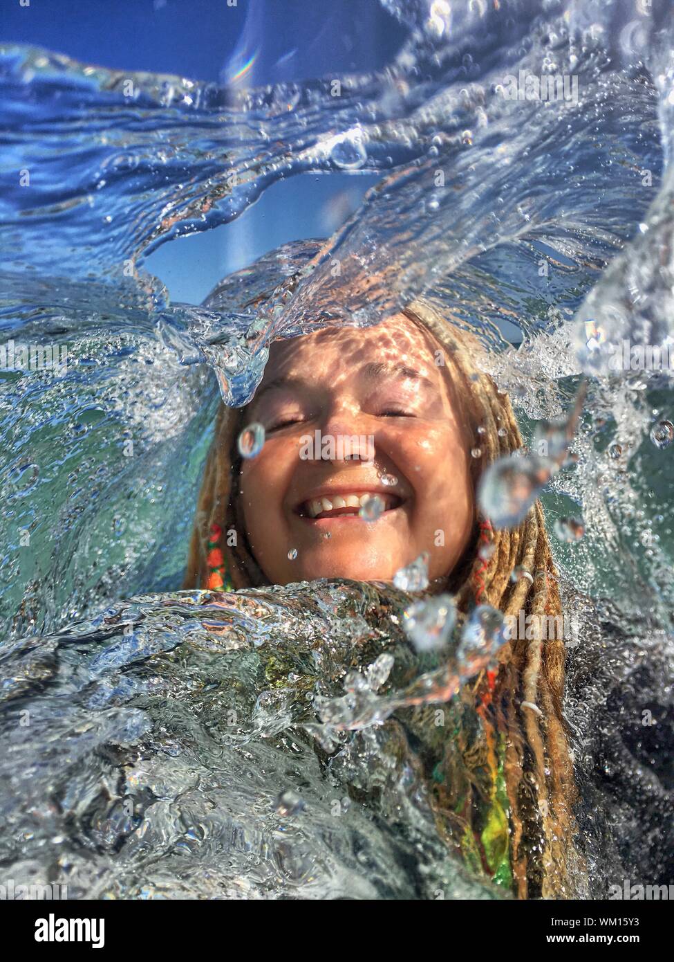 Woman swimming in water hi-res stock photography and images - Alamy
