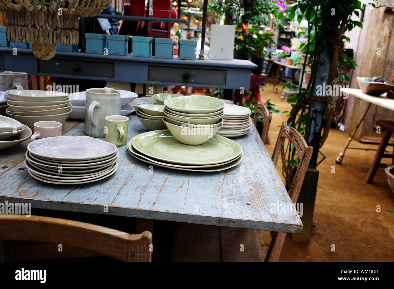 vintage dinning room and table with crockery. Stock Photo