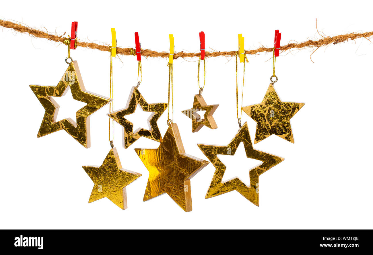 Golden Christmas stars, isolated over white background Stock Photo - Alamy