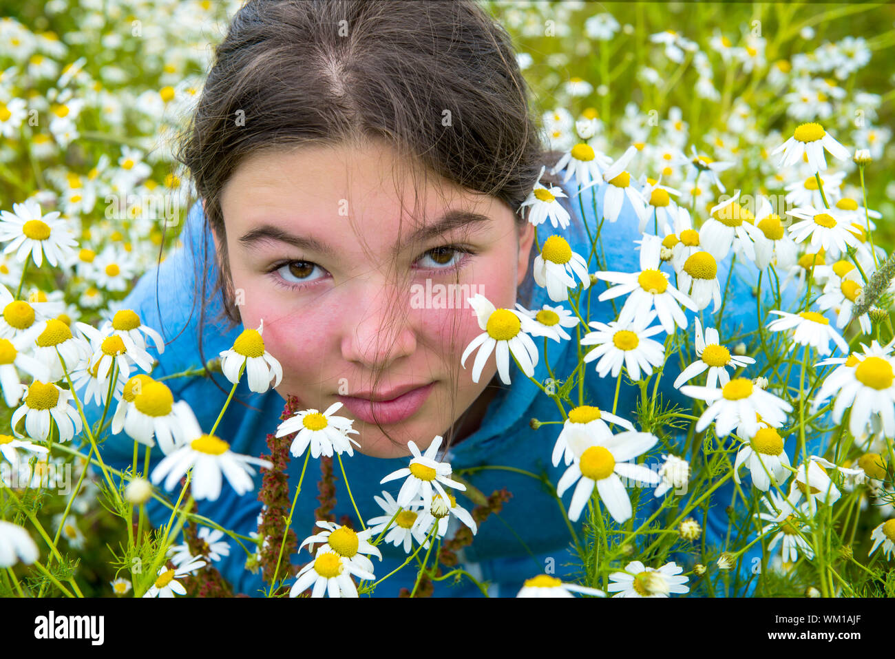 Portrait Of Woman Amidst Flowering Plants Stock Photo